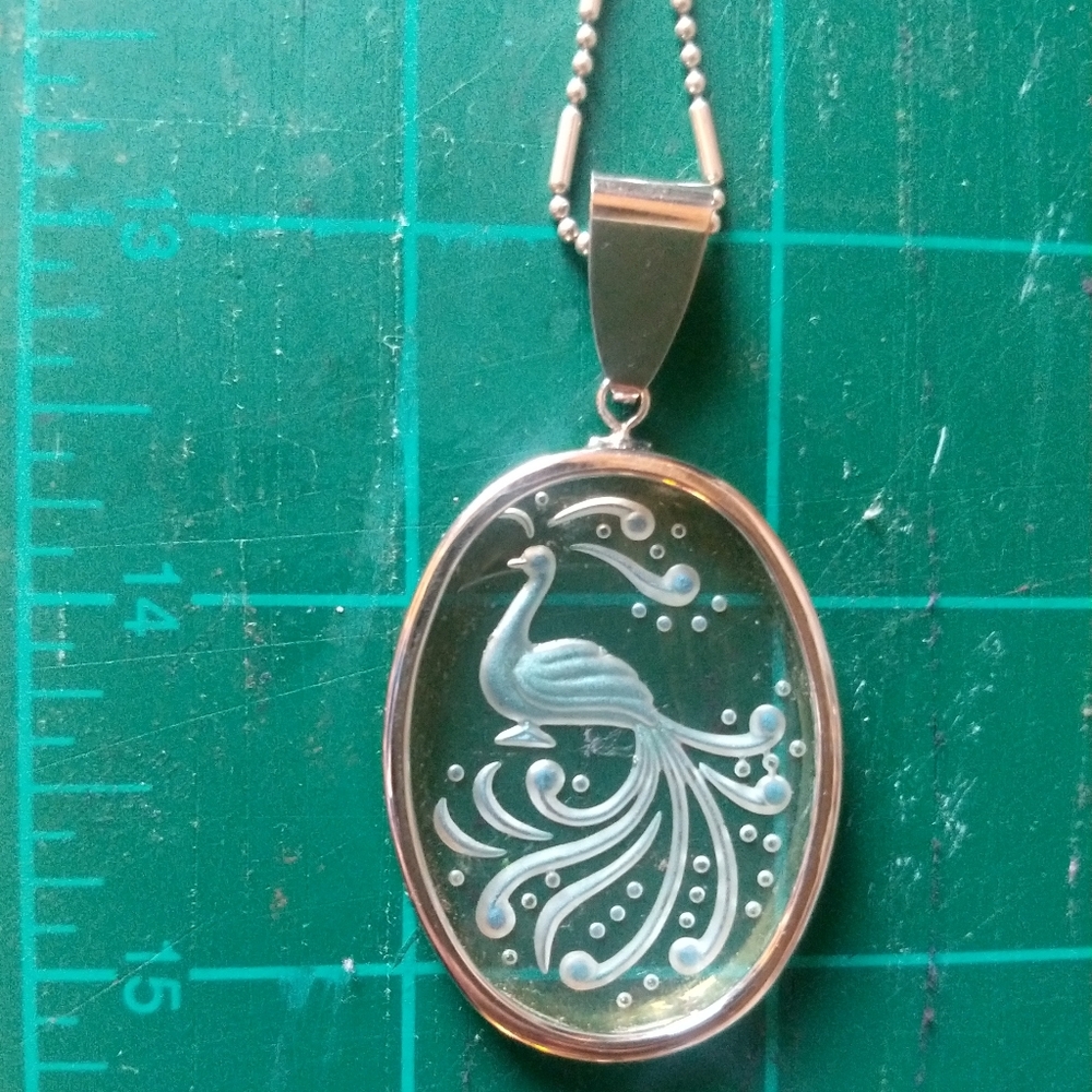 Cut glass peacock pendant necklace on silver chain